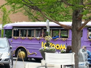 A glimpse of the crazy purple LAZOOM bus. Featuring bands & beer or comedy tours.